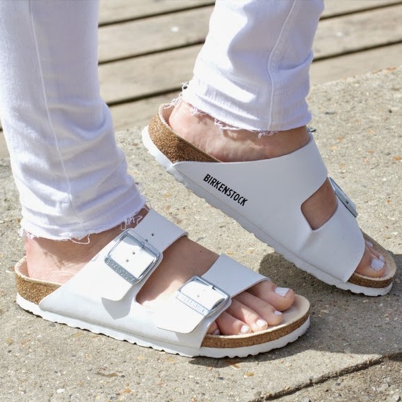 white birkenstocks on feet